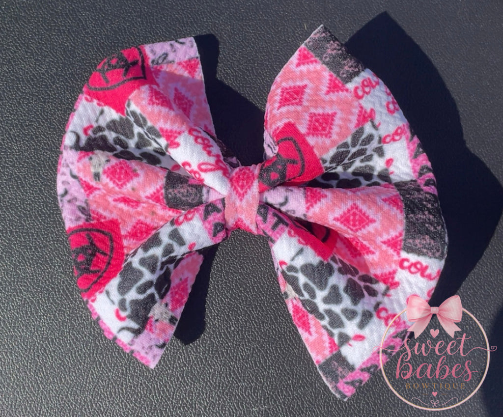 Pink cow girl boots bow